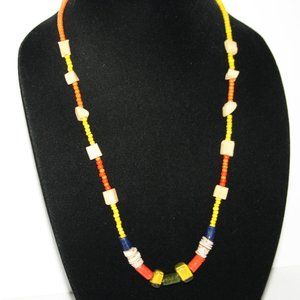 Vintage beautiful orange, yellow and bone beaded necklace 25"